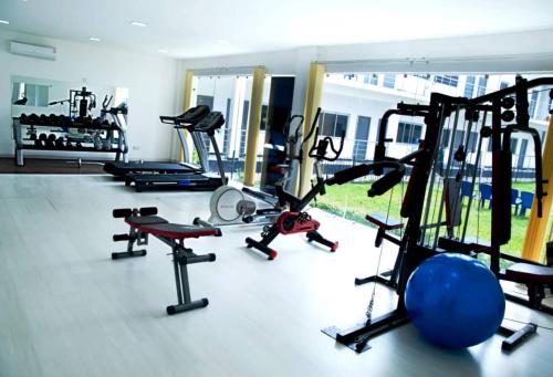 a gym with several treadmills and exercise bikes at SPIRIT OF INDIA in Lagos