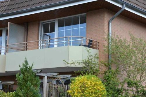 Balkón nebo terasa v ubytování _DKK11_ Ferienwohnung Strandburg