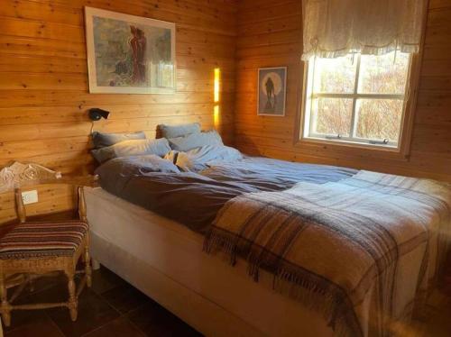 En eller flere senge i et værelse på Cozy 2 bedroom cottage with hot tub