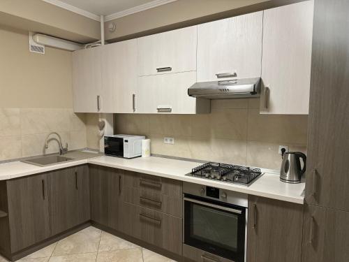Køkken eller tekøkken på Apartament Confortabil!