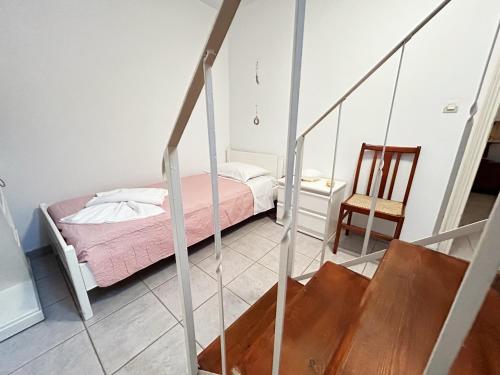 Postel nebo postele na pokoji v ubytování Dryades House in Kinidaros