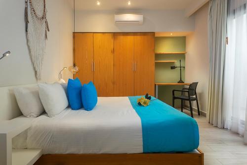 Katil atau katil-katil dalam bilik di Opal Suites Apartments