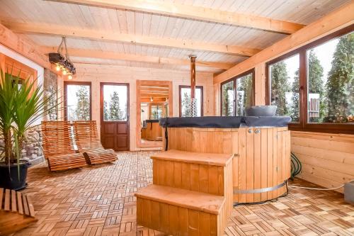 a room with a sauna in a house at Willa Pod Orłem Jacuzzi Sauna in Kościelisko
