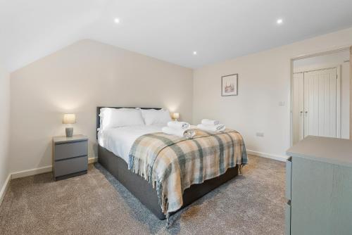 Katil atau katil-katil dalam bilik di New Apartment in Stockton, sleeps 4, Free WIFI