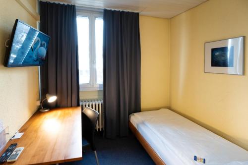 TV a/nebo společenská místnost v ubytování Hotel Bären Suhr