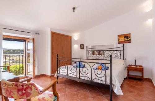 En eller flere senger på et rom på Finca Can Suave by Rentallorca