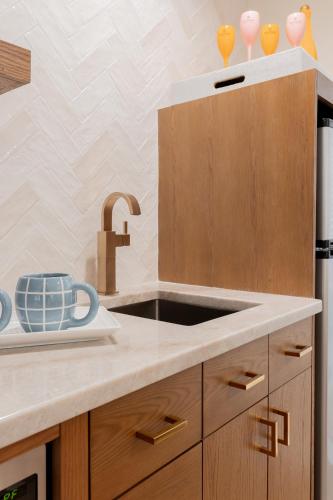 a kitchen with a sink and a counter top at The Beach Club on Madison Avenue in Cape May