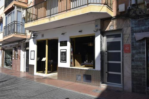 a store front with windows on a city street at SAN PEDRO 2 - Fincas Arena in Benidorm