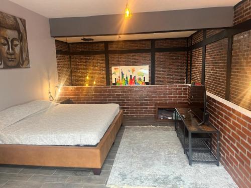Giường trong phòng chung tại TRIBECA BEACH CASA BONITA