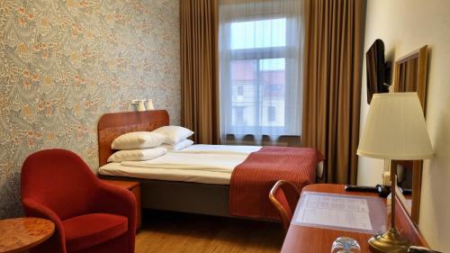 Cama o camas de una habitación en Hotel Lorensberg