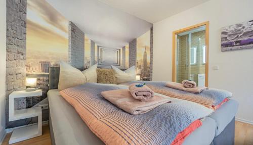 Postel nebo postele na pokoji v ubytování Appartment am Weltspiegel
