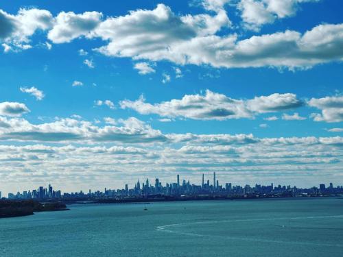 a view of a large city from the water at Ly New York Hotel in College Point