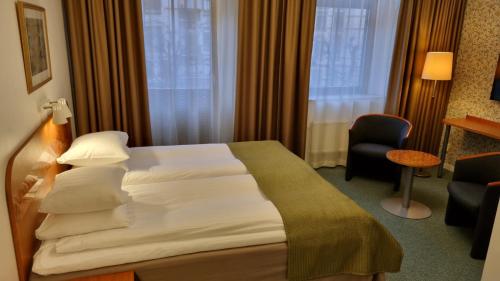 Cama o camas de una habitación en Hotel Lorensberg
