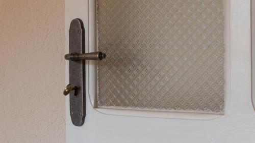 a close up of a door with a door knob at Villa Il Casale Onifai in Onifai