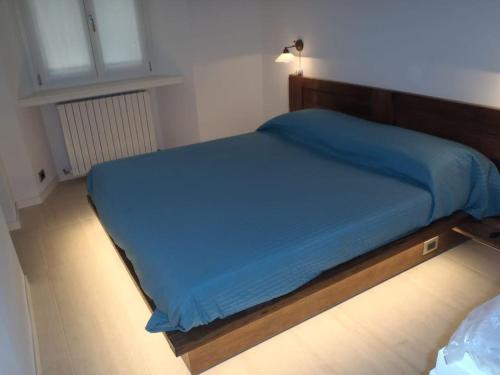 Ein Bett oder Betten in einem Zimmer der Unterkunft B-Lake Apartment Bellagio