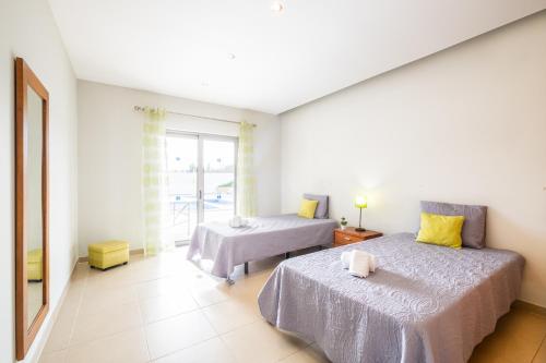 Postel nebo postele na pokoji v ubytování Villa Aica - BY BEDZY