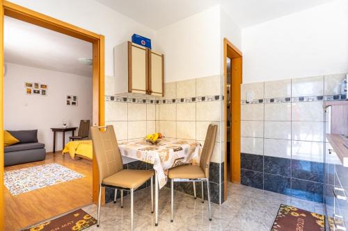 Køkken eller tekøkken på Apartmani Medena, Cres