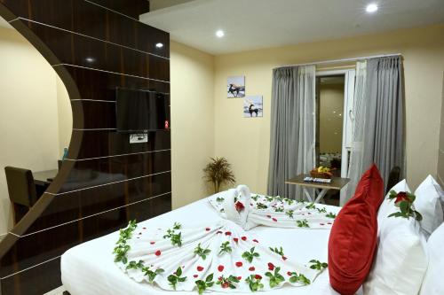 Cama o camas de una habitación en Hotel Trax International
