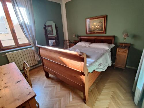 Een bed of bedden in een kamer bij EstateGuard Group - Prestige Rooms Lucca City Center