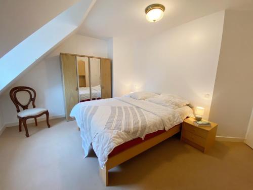 En eller flere senge i et værelse på Kerbachic, maison à Plouharnel