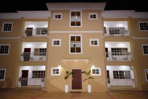 an exterior view of a building at night at 1118 Serenity Residence in Abuja