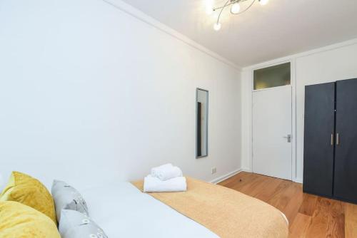 מיטה או מיטות בחדר ב-Central London- 1 Bed Apartment!