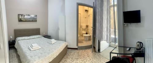 Posteľ alebo postele v izbe v ubytovaní Nel cuore Di Napoli