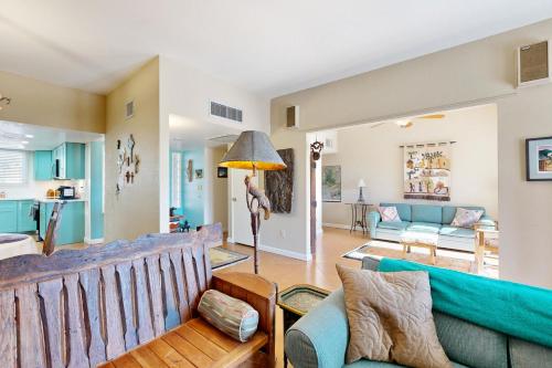 a living room with a couch and a table at Camino los Mochis in Tucson