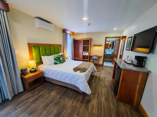 Katil atau katil-katil dalam bilik di Sibu Boutique Hotel