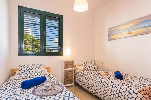 Postel nebo postele na pokoji v ubytování Villa Manrique by Villa Plus