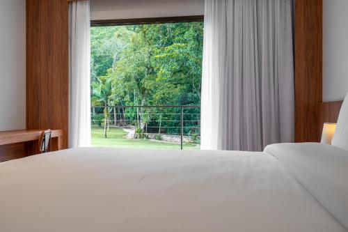 Vert Hotel Penedoにあるベッド