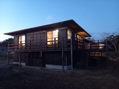 a house with a staircase in front of it at Umidori Hutte - Vacation STAY 91968v in Hongō