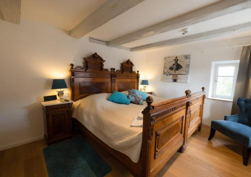 Säng eller sängar i ett rum på Hotel Burg Abenberg