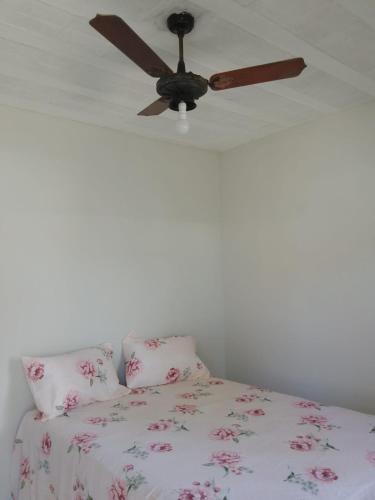 Ένα ή περισσότερα κρεβάτια σε δωμάτιο στο Suíte Sunflower 103