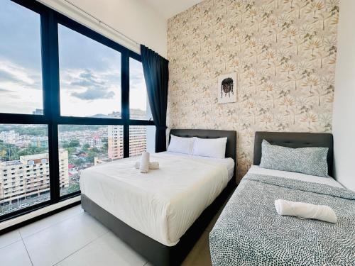Katil atau katil-katil dalam bilik di New 2BR OR 3BR Serenity Homestay at Urban Suite by URBAN STAYCATIONS LOD