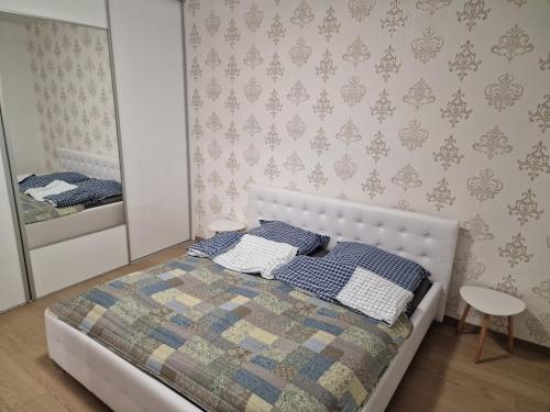Posteľ alebo postele v izbe v ubytovaní Stylish Panorama City Family Suite