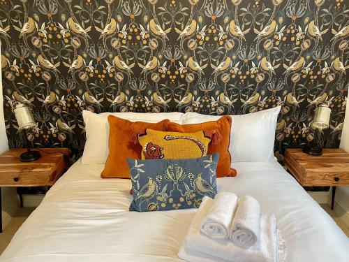 Katil atau katil-katil dalam bilik di Cosy Oasis in the Heart of Clifton Village