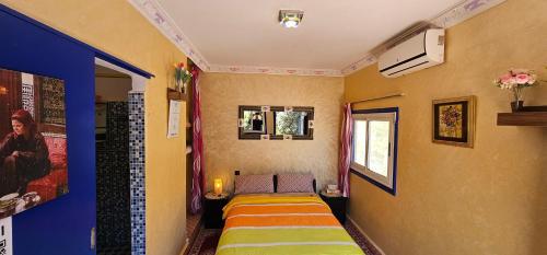 Ein Bett oder Betten in einem Zimmer der Unterkunft Top Ourika