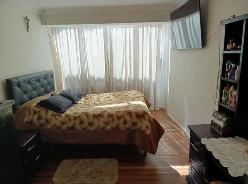 Un pat sau paturi într-o cameră la W&F