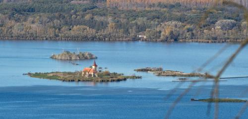 an island in the middle of a large body of water at Dům Pálava in Perná
