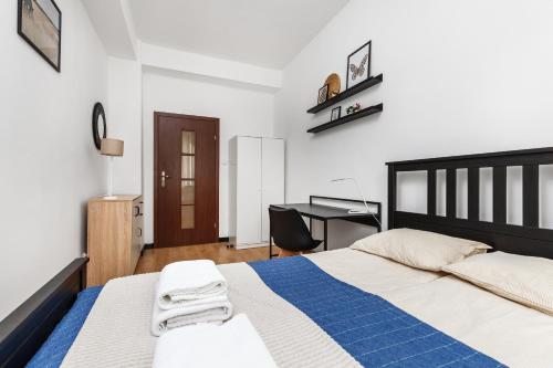 Giường trong phòng chung tại Prime Home CENTRUM 2