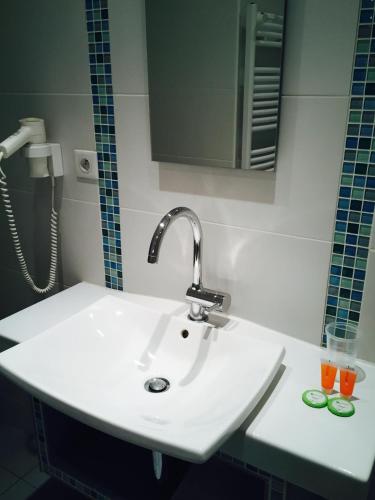 Ένα μπάνιο στο Hôtel & SPA Rodier