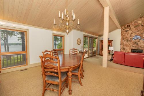 a dining room with a table and chairs at Wake N Lake in Littleton