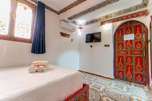 Letto o letti in una camera di Hotel Chefchaouen