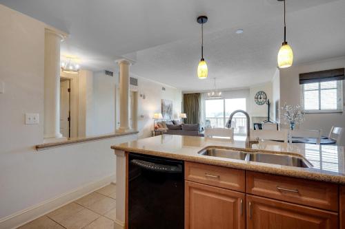 a kitchen with a sink and a counter top at Marina Inn Grande Dunes - 7-503 in Myrtle Beach