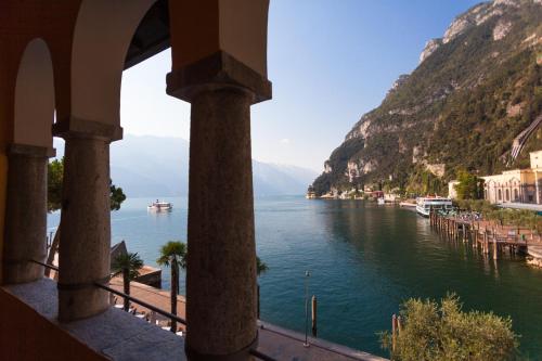 a view of a body of water from a building at Hotel Sole Relax & Panorama in Riva del Garda