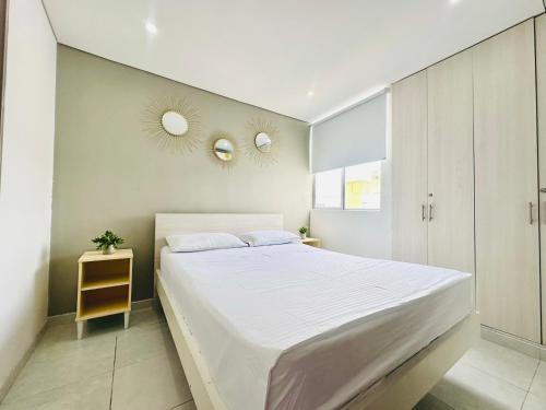 Ένα ή περισσότερα κρεβάτια σε δωμάτιο στο Apartamento REMODELADO Moderno y Completo a 5 minutos de Girardot - Cerca a Dollar City, Supermercados D1, ARA y Carulla