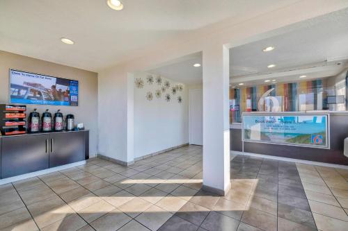 a lobby of a hotel with a pharmacy at Motel 6-Anaheim, CA - Fullerton East in Anaheim