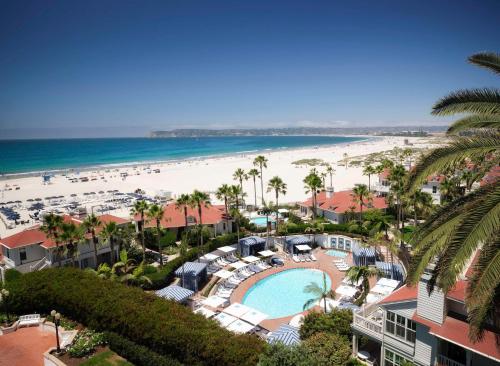 a view of the beach from the balcony of a resort at Beach Village at The Del, LXR Hotels & Resorts in San Diego