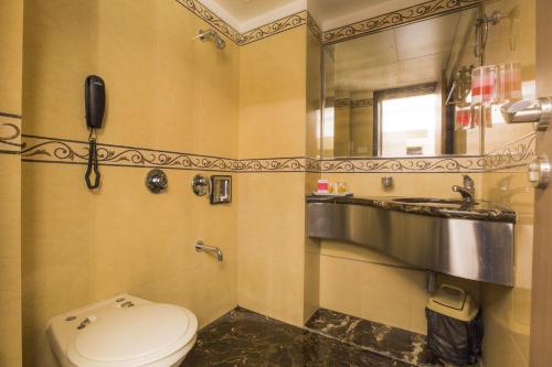 Ванная комната в Hotel Airport International Mumbai